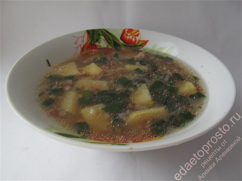 овощной суп с тмином в тарелке фото